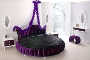 bedrooms-fabulous-purple-round-bed-design-inspiration-with-purple-tufted-headboard-and-beautiful-bed-curtain-for-beautiful-bedroom-decoration-excellent-round-beds-for-a-unique-look-bedroom