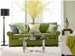 fabulous-modern-style-green-sofas-round-glass-coffee-table-615x462
