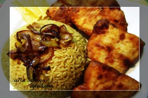 سمك مقلي مع رز الصيادية