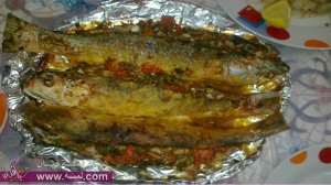اكلات سمك بالصور طريقة عمل سمك مشوي بالفرن بالصور2014