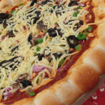 معجنات سهلة رمضانية 2014 – كيفية عمل بيتزا منال العالم لرمضان 2014